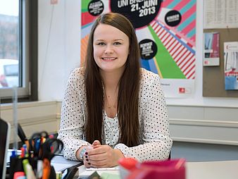Young woman at a desk