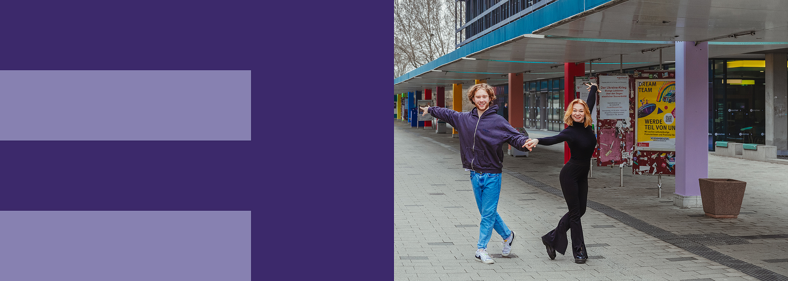 Two students are dancing on the boulevard of the University of Bremen.