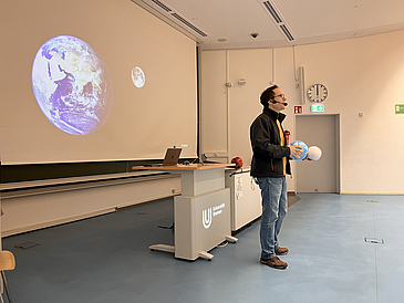 Marc Avila in front of his youngest students.