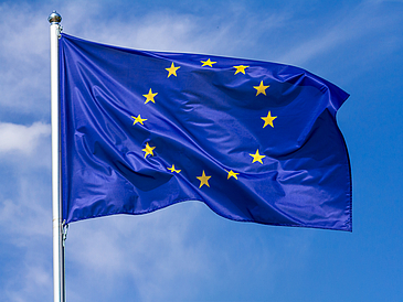 EU-Flag in front of blue sky