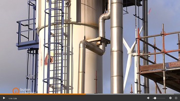 It shows a blast furnace pipe with a ladder and several platforms to stand on.