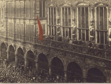 People hoists the red flag at the Bremen Town Hall
