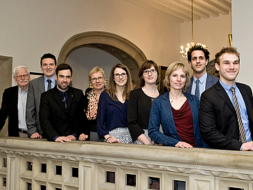 Gruppenbild mit vier Frauen und fünf Männern.