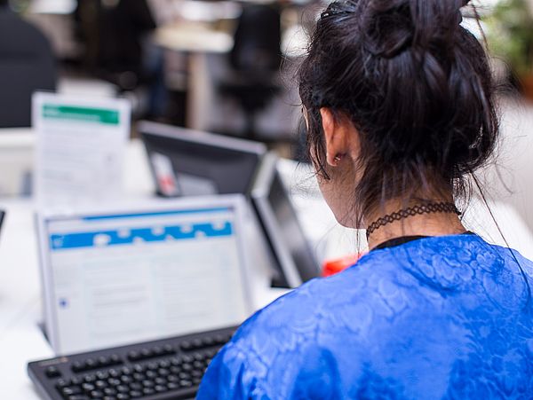 A student at the laptop.