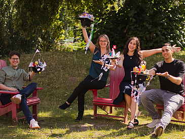 Thomas Mildner, Nadine Wagner, Evropi Stefanidi and Nima Zargham with their PHD hats